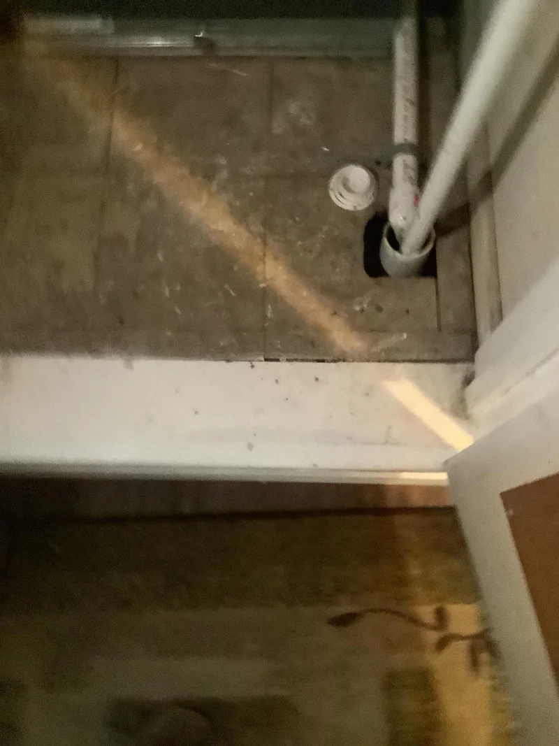 HVAC utility area and adjacent flooring photographed in the North Richland Hills water-mitigation project